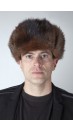 Tamsi poliarinio šeško kailio rusiško modelio kepurė
